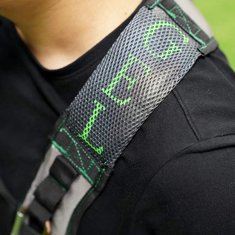 Close-up of Gel Padding Tool Belt Suspenders With Breathable Gel Shoulder Pad, showing green lettering and mesh texture.