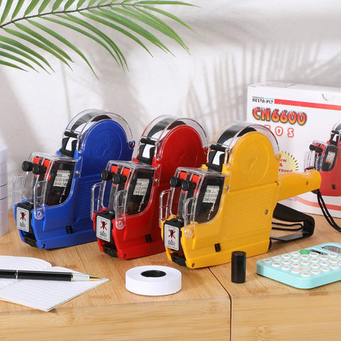 Three Set Price Gun Labeler Kit With Fifteen Thousand Blank White Labels And Three Ink Rolls Date Gun on a wooden table