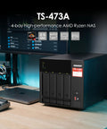 Heavy-Duty 4-Bay Desktop Nas Built To Crush Massive Data Loads Without Breaking A Sweat showing front view with USB port.