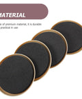 Four round black EVA glide pads from the 100 Pack, designed for smooth movement on hardwood or carpet.