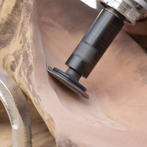 Heavy Duty Mini Turbo Angle Grinder Kit With 50 Millimeter Tungsten Cutters in use on wood for freehand sculpting.