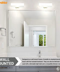 Bathroom with Lit Dual Socket Vanity Light Fixture With Frosted Glass Shade For Wall Mount Bathrooms above mirror