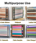 Top Shelf Adjustable Rolling Fabric Display Rack With Wheels And Multiple Rod Storage Heavy Duty Mobile Clothing And Vinyl Film Holders For Garage Workbench Setup Maximize Your Space Straight Up showing various materials like wallpaper, leather rolls, and fabric samples.