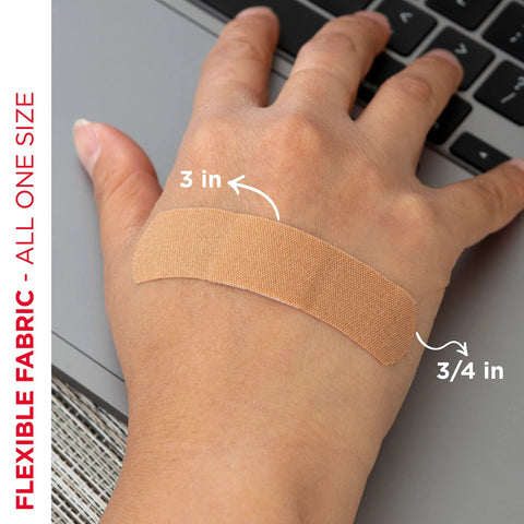 Band-Aid fabric adhesive bandage on hand, skin-tone, 3 in x 3/4 in, one bandage