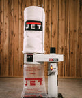 Heavy Duty Portable Shop Dust Collector Featuring 30 Micron Bag Filter And 1 Hp Motor For Dead Quiet Garage Cleanup And Smooth Man Cave Workflow Plus Four Grippy Rollin Casters upright view of dust collector with white filter bag.