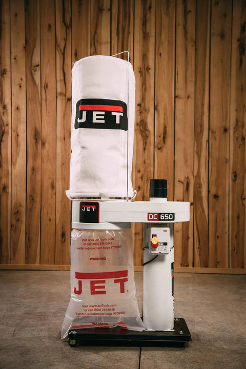 Heavy Duty Portable Shop Dust Collector Featuring 30 Micron Bag Filter And 1 Hp Motor For Dead Quiet Garage Cleanup And Smooth Man Cave Workflow Plus Four Grippy Rollin Casters upright view of dust collector with white filter bag.