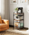 Heavy Duty 5 Tier Floor Standing Coffee Cart With Spacious Pod Storage Organizer For Kitchen Bar Station, black and brown metal frame.