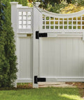 White wooden gate with 5 Inch Heavy Duty Gate Hinges 260 Lbs Capacity Black 4 Pack For Wooden Fences And Barn Doors With Screws Included.