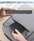 External Blu Ray Drive On The Go Portable Blu Ray Player And CD DVD Burner With USB 3 And Type C Reader Read BD DVD CD Plug And Play Lightweight For Windows Mac Linux 2 In 1, slim black drive held above laptop bag