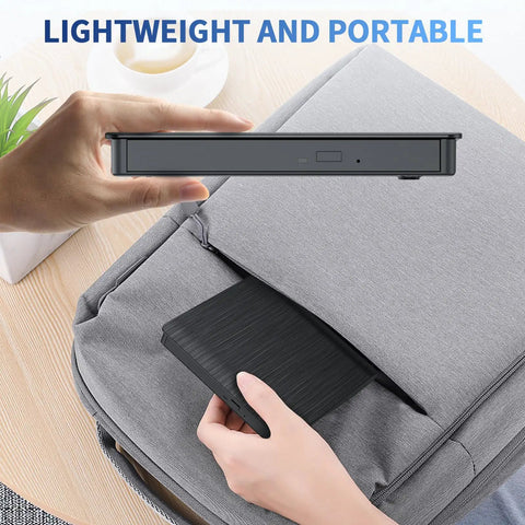 External Blu Ray Drive On The Go Portable Blu Ray Player And CD DVD Burner With USB 3 And Type C Reader Read BD DVD CD Plug And Play Lightweight For Windows Mac Linux 2 In 1, slim black drive held above laptop bag