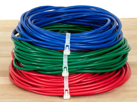 Twelve Inch Natural Releasable Cable Ties Reusable Nylon Zip Ties With Gnarly Tight Fifty Pound Hold In A Dope Hundred Pack securing colorful wires.
