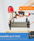 Hand holding 18 Gauge Pneumatic Brad Nailer Kit With 2000 Nails Included Lightweight Finish Nail Gun For Trim And Small Woodwork
