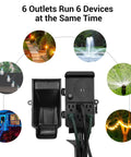 WiFi Smart Yard Stake Plug With Six Outlets, Waterproof Power Timer, 6Ft Cord shown with connected outdoor lights.