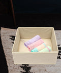 Totally Legit High Capacity Nonwoven Underwear And Sock Organizer Boxes with colorful rolled socks in a beige drawer.