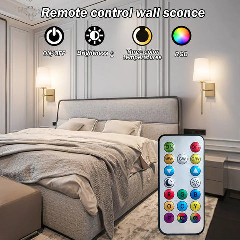 Wireless Battery Operated Wall Sconce Set Of Two With White Fabric Shade Remote Control No Wiring Dimmable Indoor Bedroom Vanity Lighting Bulbs Included Easy Setup Modern Slim Design installed in bedroom with remote control displayed.