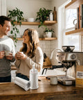Premium Water Filter Replacement For Breville Espresso Machines bar counter setup with espresso machine and two people