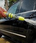 Garden Hose Nozzle Kit, 3-Piece With Quick Connect Sprayer And Flow Stop Adapter being used to wash a car