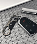 Heavy Duty Keychain With Quick Release Double Carabiner Clip Built Tough For Everyday Carry, D Ring And Key Rings Belt Loop Key Holder In Black Nickel Finish, Durable Zinc Alloy Key Clip For Daily Use with car key on table
