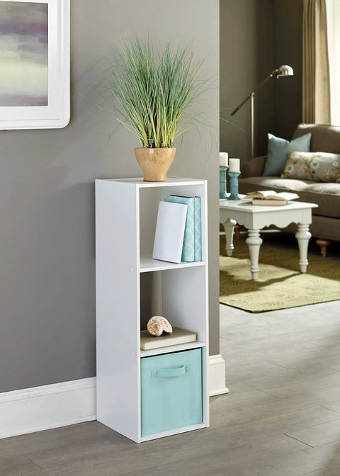 Three Cube Storage Organizer Bookshelf For Books And Decor in white wood with potted plant on top in a living room setup