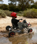 Powerful 2000W Electric Go Kart With Steel Tubular Frame And 8 Inch Off Road Tires speeding through water, black, side view