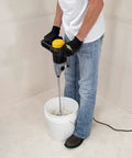Person using 120 Volt 2 Speed Power Mixer with Mixing Paddle for thinset mortar and grout, lightweight ergonomic grip, 1300W electric cement mixer.