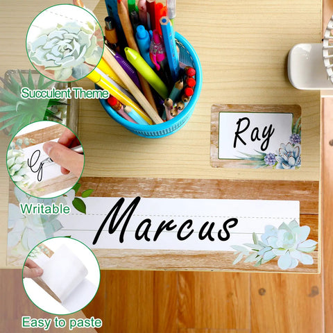 48 Pieces Rustic Bloom Name Tags Self Adhesive Labels With Succulent Theme For Desk Bulletin Boards And Classroom Decor Retro Farmhouse Vibe Perfect For Teachers Offices Schools And Baby Showers, displayed on a desk with stationery.