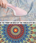 Round Fitted Tablecloth With Elastic For Outdoor Tables, Waterproof, colorful mandala pattern being ironed, text instructions