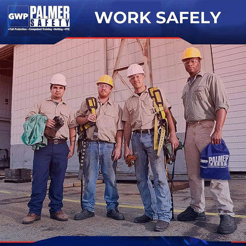 Construction workers wearing heavy duty full body safety harness kit with detachable 6 ft lanyard outside a building