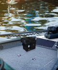 Built Like A Tank Group U1 Battery Box With High Flow Vents And Beefed Up Carry Bars For Lockdown Storage On John Deere Utility Xuv MGator Daily Drivers Lawn Tractors on a boat deck.