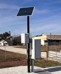 12V 30W Solar Battery Trickle Charger And Maintainer With Waterproof 30 Watt Solar Panel with pole mount in outdoor setting