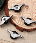 Heavy Duty Sliding Door Roller Wheels Kit With Slick Nylon Casters For Barn Glass And Closet Doors on a wooden surface.