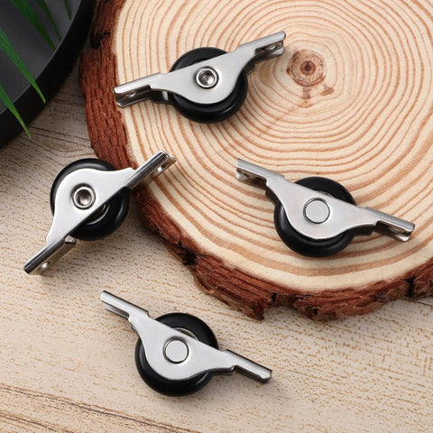 Heavy Duty Sliding Door Roller Wheels Kit With Slick Nylon Casters For Barn Glass And Closet Doors on a wooden surface.