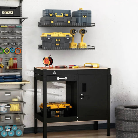 Heavy-Duty Wall Mounted Garage Shelves 2 Pack Metal Storage Racks Black 23.5 By 12 Inches Durable Powder-Coated Steel Shelves Space Saving Organizer for Workshop Shed and Shop, mounted above workbench holding tools and cases.