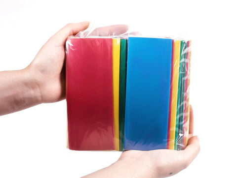 Hands holding Large Size Heat Shrink Tubing Kit with 145 pcs in 5 colors, ideal for RC hobbies and wire insulation.