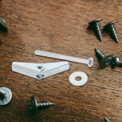 Heavy Duty Carbon Steel Drywall Anchors And Hollow Wall Expansion Screws With Petal Umbrella Clips M5 By 60 Assortment Kit parts on wood.