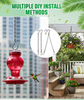 Two Pack Heavy Duty Hanging Chains For Bird Feeders Planters Lanterns And Ornaments Black Nine Point Five Inch Supports Up To Twenty Lbs Adjustable Hook To Shorten Or Extend No Fuss Install And Remove For A Flexible Do It Yourself Setup displayed with bird feeder and plant setup