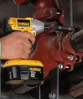 Using 1/4-Inch Hex Drive To 3/8-Inch Socket Adapter For Drills on red valve, heavy duty tool accessory in action