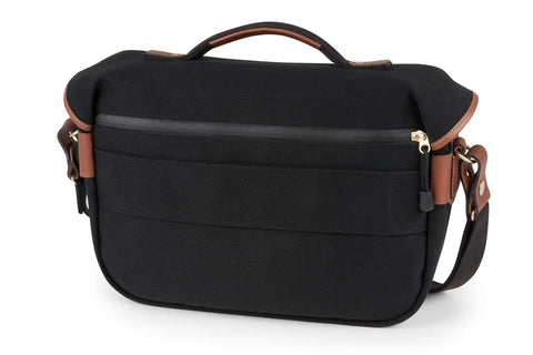 Back view of Hadley Pro 2020 Camera Bag With Removable Padded Insert In Black Canvas Tan Leather Weather Resistant Build