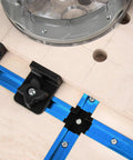 Close-up of Six Pack Aluminum T Track Intersection Kit for 3/4 Inch by 3/8 Inch Universal Double Cut T Track on woodworking table