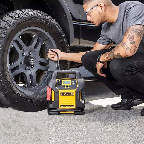Person using Legit Replacement 14.5V DC Charger Car Adapter Compatible With Dewalt DXAEPS14 Jump Starter on tire.
