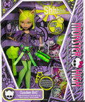 Clawdeen Wolf Dawn Of The Dance Reproduction Doll in purple zip dress, green tights, holding accessories. Collector piece.