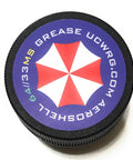 Mil Spec Gun Grease 64 33MS Go To Multi Purpose Lubricant jar view with logo and text on the lid.