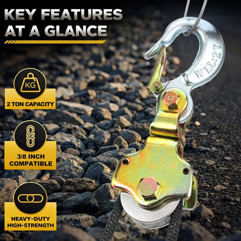 Hella Sturdy 2 Pack Snatch Block Pulley With Swivel Eye And Hoist Hook 2 Ton 4400 Lbs Capacity Zinc Coated Steel close up of pulley with hook and features on rocky surface.