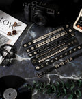 Dope Eight Piece Punk Rock Studded Leather Bracelet Set With Adjustable Spiked Zinc Cuffs for that raw 80s concert vibe displayed on a dark surface.