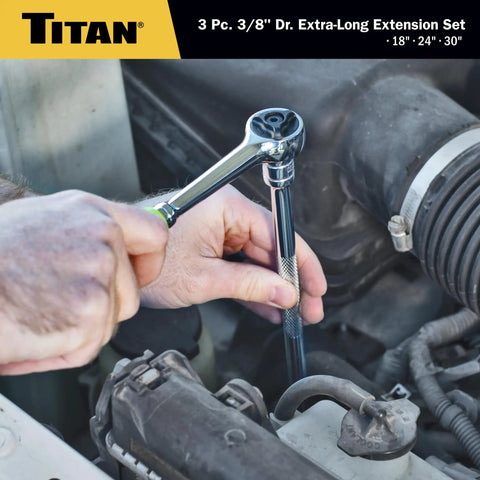 Mechanic using Three Eighth Inch Drive Extra Long Extension Set With 18 Inch 24 Inch 30 Inch Extensions Chrome Plated Cr V Steel for engine repair.