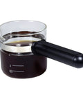 4 Cup Borosilicate Glass Espresso Carafe With Long Handle And Angled Spout For Easy Pouring Universal Fit For Most Espresso Makers Compatible With Krups 867 963 972 985 871 872 XP1500 XP1020 And Mr Coffee filled with espresso