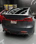 Mean Looking Sequential Led Tail Lights And Trunk Light Bar For Tesla Model 3 And Y Gen Two installed on a grey Tesla Model Y.