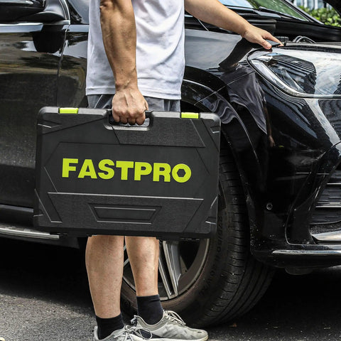 Person holding case for 249-Piece Mechanics Tool Set Must-Have Pro Grade with SAE and Metric Sockets near car