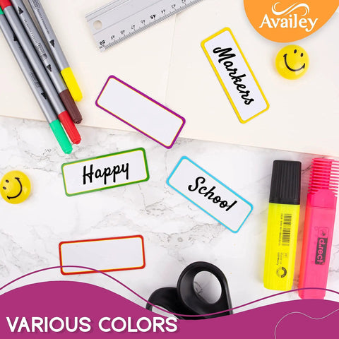 Color Border Magnetic Dry Erase Labels 48 Piece Bulk Pack Reusable Magnetic Strips For Classroom Home Office Garage Refrigerator Locker Shelf Organization shown with markers, highlighters, and stationery.
