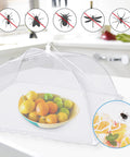 Outdoor Mesh Food Covers Set 10 Pack Pop Up Tents for Picnic and Camping displayed in a kitchen over a bowl of fruit with insect icons.